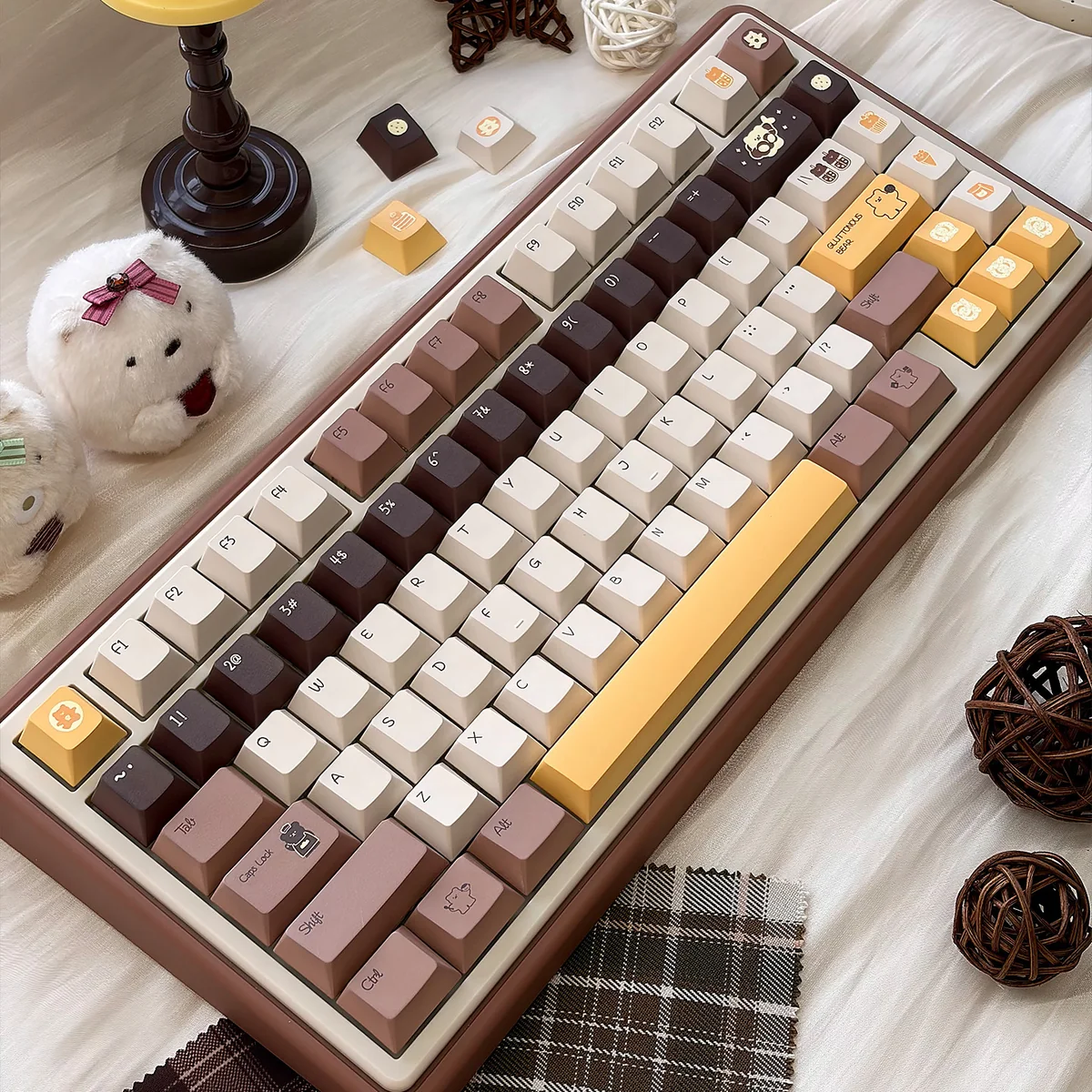 Adorable Butter Bear PBT keycap set featuring cute bear illustrations in warm hues for a whimsical keyboard.