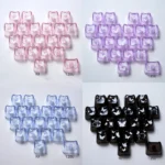 Close-up of whimsical glowing butterfly heart keycaps set, made from translucent PC, featuring vibrant backlighting for a playful and delightful keyboard.