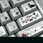 Elegant Butterfly Love Flowers Keycap Set showcasing lustrous pearlescent metallic butterfly-flower designs from various angles, highlighting their shimmering finish.