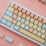Adorable Candy Puppy PBT Dye-sub Keycap Set showcasing playful pastel dog designs from various angles, bringing whimsical charm to keyboard.