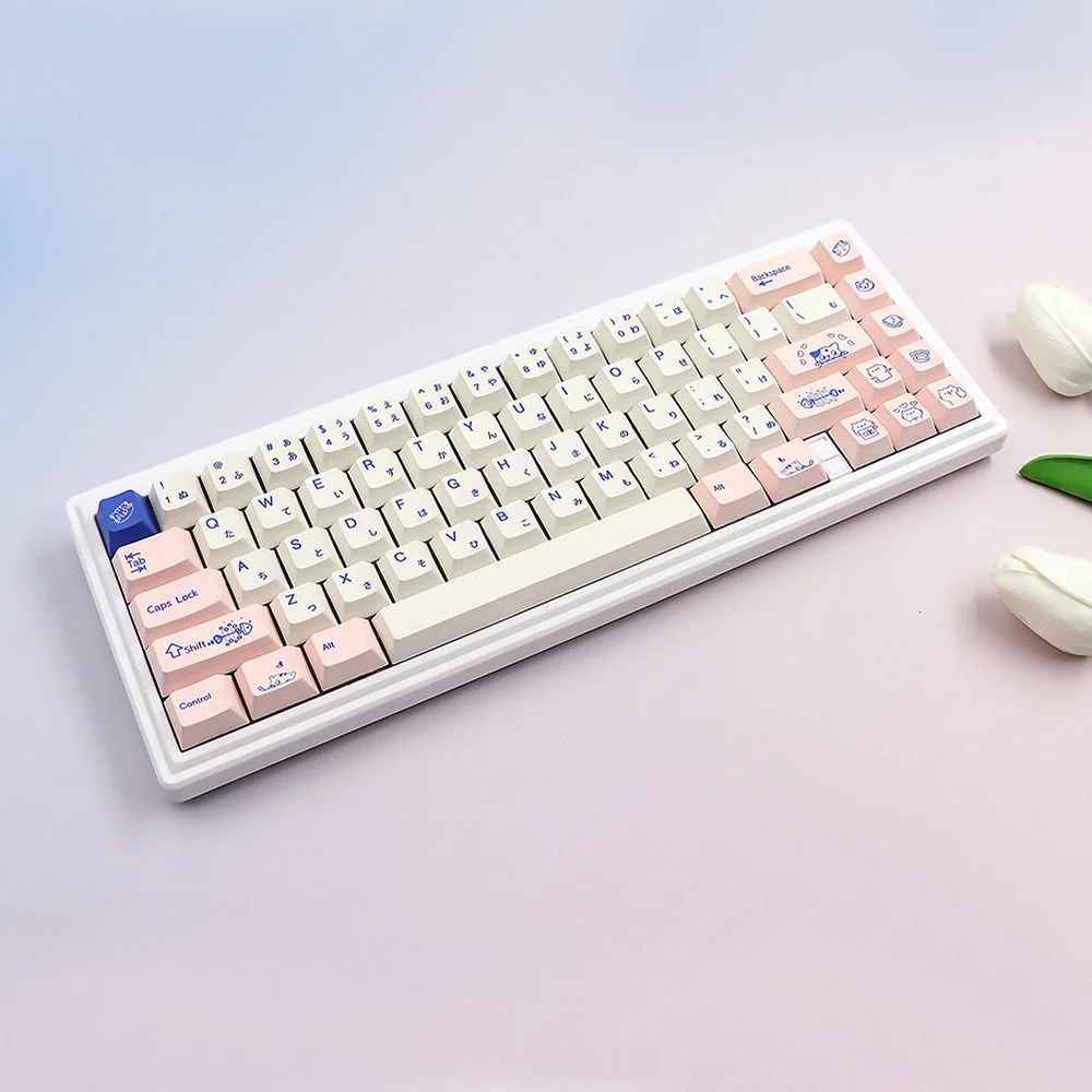Close-up of the adorable PBT cat keycaps set, showcasing the whimsical Japanese feline illustrations and dye-sublimated details from a delightful design.