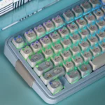 A full set of playful cat-themed PBT translucent keycaps set, showcasing adorable cat ears and vibrant designs from multiple angles for a charming keyboard.