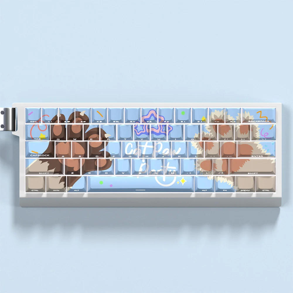 Adorable cat paw PBT dye-sub keycaps set displayed on a keyboard, featuring whimsical pastel colors for a playful aesthetic. Perfect for cat lovers.