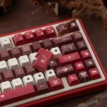 Adorable Tipsy Cat PBT Keycaps Set, showcasing whimsical, relaxed cat dye-sub designs in soft pastel hues. Artistic Cat PBT Keycaps for cozy comfort.