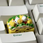 Close-up of a unique handcrafted Cat Taco Keycap, featuring a whimsical cat character nestled in vibrant artisan resin art.