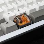 Iconic Fiery Charizard keycap, dynamically presented from various angles, with vibrant detail for unleashing gaming nostalgia in keyboard customization.