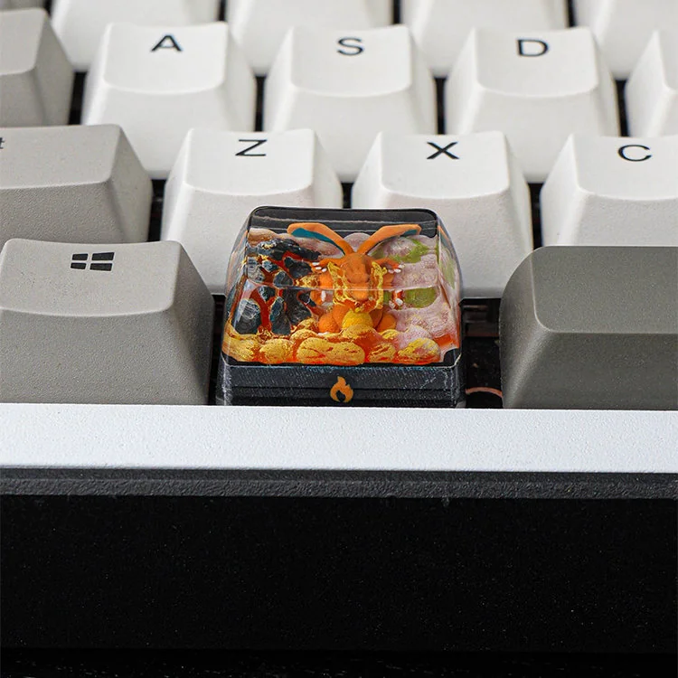 Fiery Charizard Keycap vividly displaying the iconic character, perfect for unleashing gaming nostalgia and ultimate keyboard customization.
