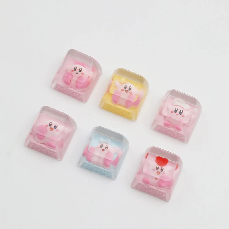 Handcrafted Chef Kirby artisan keycap, shown from a charming new angle, featuring its adorable chef's hat and intricate details for a whimsical desktop.