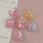 Multiple angles of the adorable handcrafted Chef Kirby artisan keycap, highlighting its whimsical chef's hat and intricate details as a charming desk setup.
