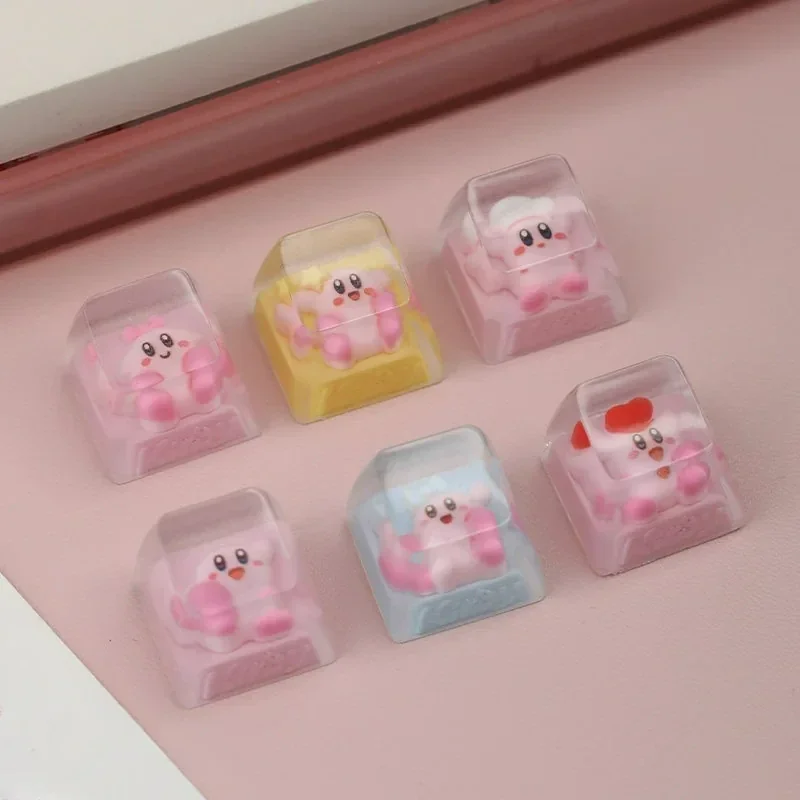 Handcrafted Chef Kirby artisan keycap displayed from various angles, highlighting its adorable details and whimsical charm as a unique desktop accent.