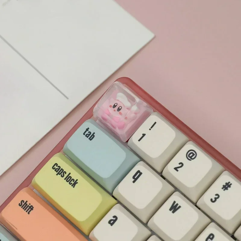 Adorable handcrafted Chef Kirby artisan keycap in a chef's hat, bringing whimsical charm to your mechanical keyboard setup.