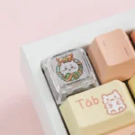 Adorable Chiikawa Christmas artisan keycap, viewed from a whimsical angle, showcasing its detailed festive design and playful holiday spirit.