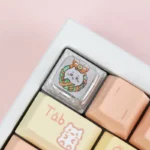 Adorable Christmas Chiikawa artisan keycap featuring the beloved character in a festive Santa hat, bringing joyful holiday charm to your mechanical keyboard.