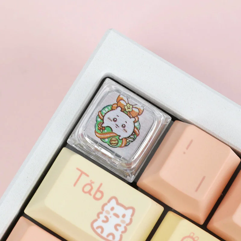 Adorable Christmas Chiikawa artisan keycap featuring the beloved character in a festive Santa hat, bringing joyful holiday charm to your mechanical keyboard.