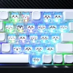 Adorable Chiikawa Hachiware MAO PC keycaps set, with whimsical hearts and translucent design, displayed from various angles for playful keyboard personality.
