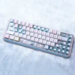Charming Chiikawa Joke Bear PBT keycap set from multiple angles, highlighting side-printed legends and translucent design for backlighting.