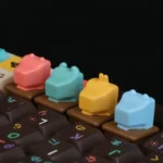 Close-up of adorable handcrafted 3D resin Chiikawa keycaps from various angles, showcasing their vibrant colors and whimsical charm, perfect for customization setup.