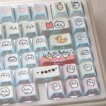 Chiikawa UR82 Tri-Mode Mechanical Keyboard, showcasing playful pastel keycaps and Chiikawa character silhouettes. A compact, high-quality keyboard.