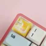Multiple views of an adorable Chiikawa handcrafted resin ESC keycap, highlighting its whimsical design and vibrant translucent finish from different angle.