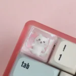 A charming gallery of Chiikawa handcrafted resin ESC keycaps, showcasing adorable characters, vibrant translucent designs, and whimsical details.