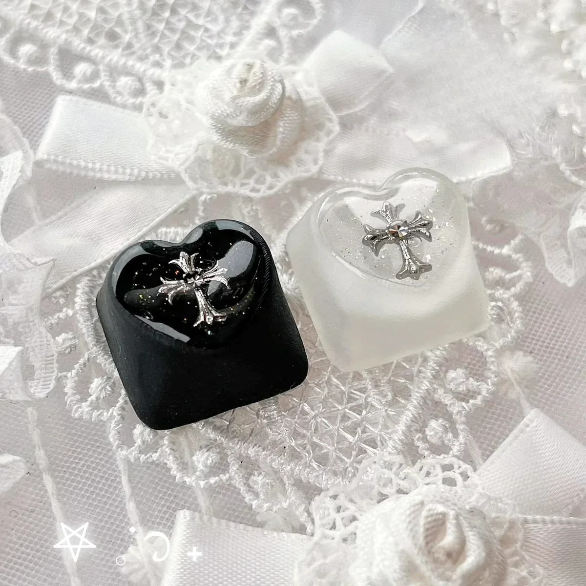 Angled Chrome Hearts Keycap, highlighting its iconic gothic cross and heart design. Its foggy transparency gives it a premium, edgy, monochromatic design.