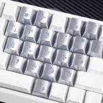 An alternate angle of the Iconic Chrome Hearts Supplement Keycap Set, highlighting the distinct gothic heart design and translucent PC material, capturing its edgy design.