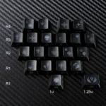 A close-up of 21 black side-engraved translucent Chrome Hearts Supplement Keycap Set, featuring the iconic gothic heart design for an edgy PC setup.