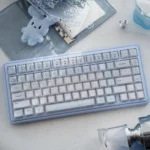Adorable Cinnamoroll crystal jelly keycaps in a playful gallery. Translucent pastel characters sparkle, showcasing their whimsical design.