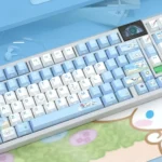 A playful collection of Cinnamoroll PBT keycaps set, showcasing the dreamy translucent side-printed legends and soft pastel colors from multiple angles.