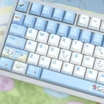 Detailed views of Cinnamoroll PBT keycaps set showcasing their dreamy translucent side-printed legends and cute pastel designs for a playful keyboard.
