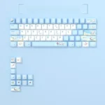 Close-up of cute Cinnamoroll PBT keycaps set, featuring dreamy translucent side-printed legends and soft pastel glow from various angles.