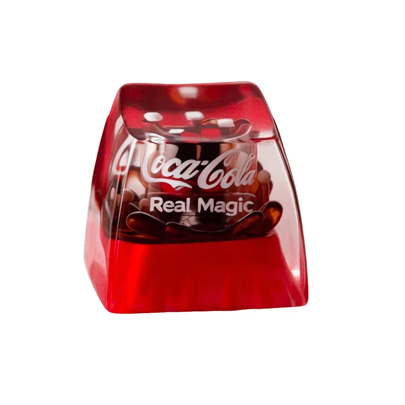 Iconic Coca-Cola artisan ESC keycap. Vibrant retro branding with glossy resin finish, capturing a classic beverage aesthetic.