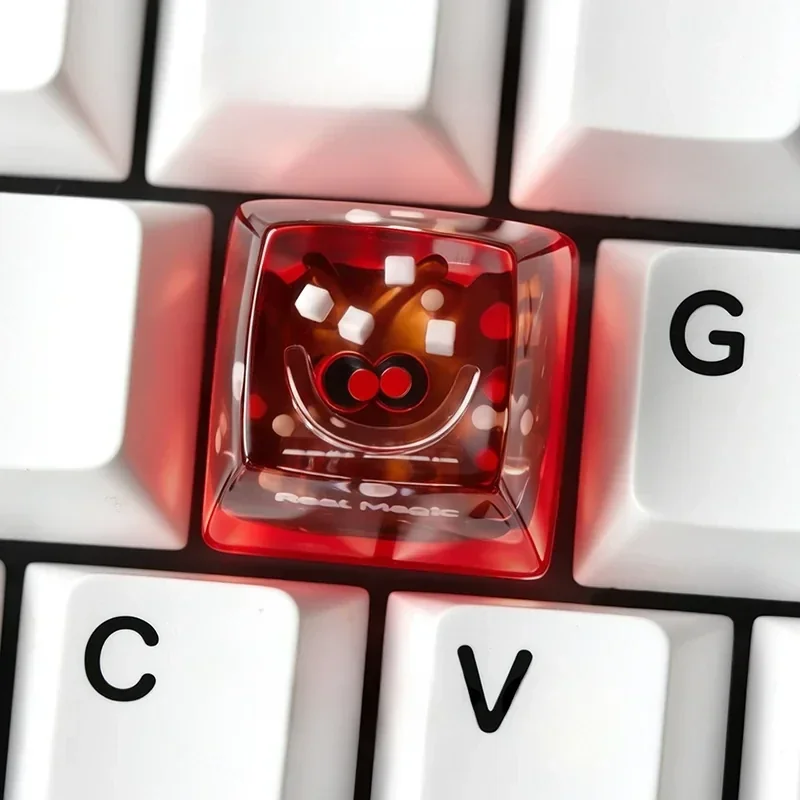 Close-up shots of the iconic Coca-Cola artisan ESC keycap, highlighting its vibrant retro branding and glossy resin finish from various angle.