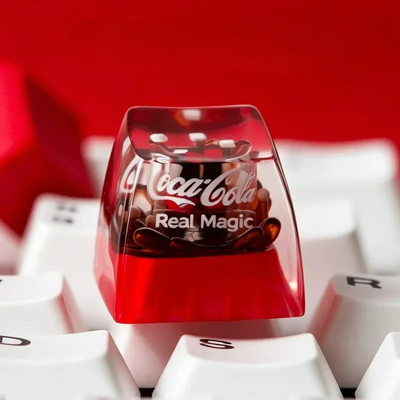 Vibrant Coca-Cola keycap, an artistic retro resin ESC artisan, featuring the iconic branding with a glossy finish, perfect for collectors.