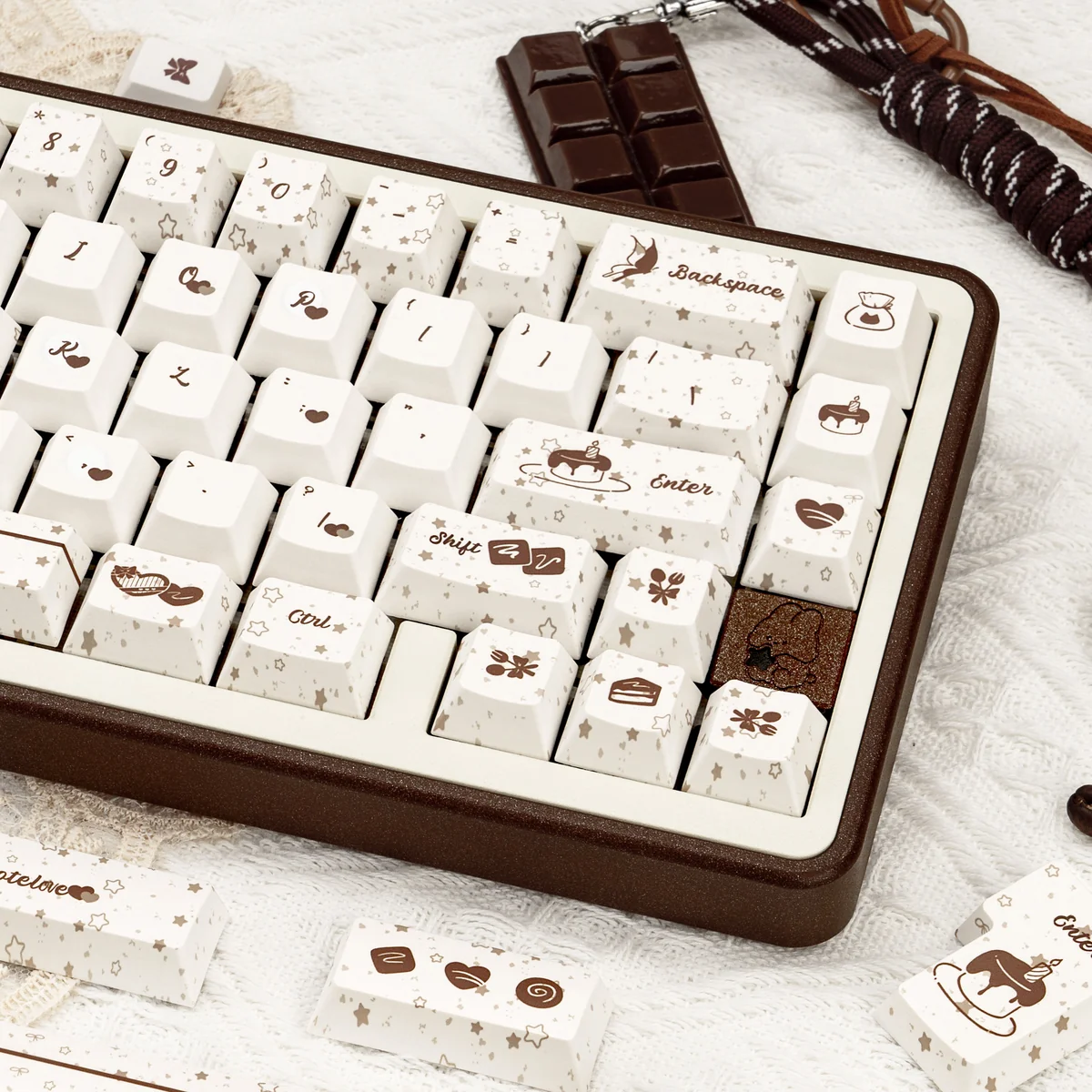 Cozy Chocolate PBT Keycaps Set displayed from a delightful angle, showcasing their premium PBT texture and unique chocolate crisp design in warm hues design.