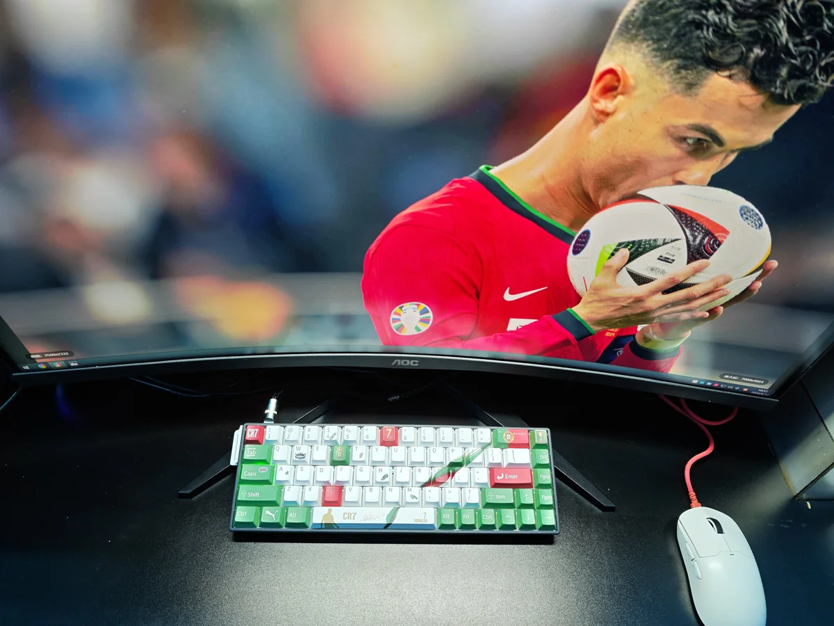 Vibrant Cristiano Ronaldo Portugal PBT keycap set from multiple angles, showcasing exclusive CR7 iconography and patriotic colors.