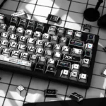 Dynamic CSGO Printstream keycaps set in a gallery, revealing their exclusive comic art and graffiti designs from various angles to unleash your gaming spirit.