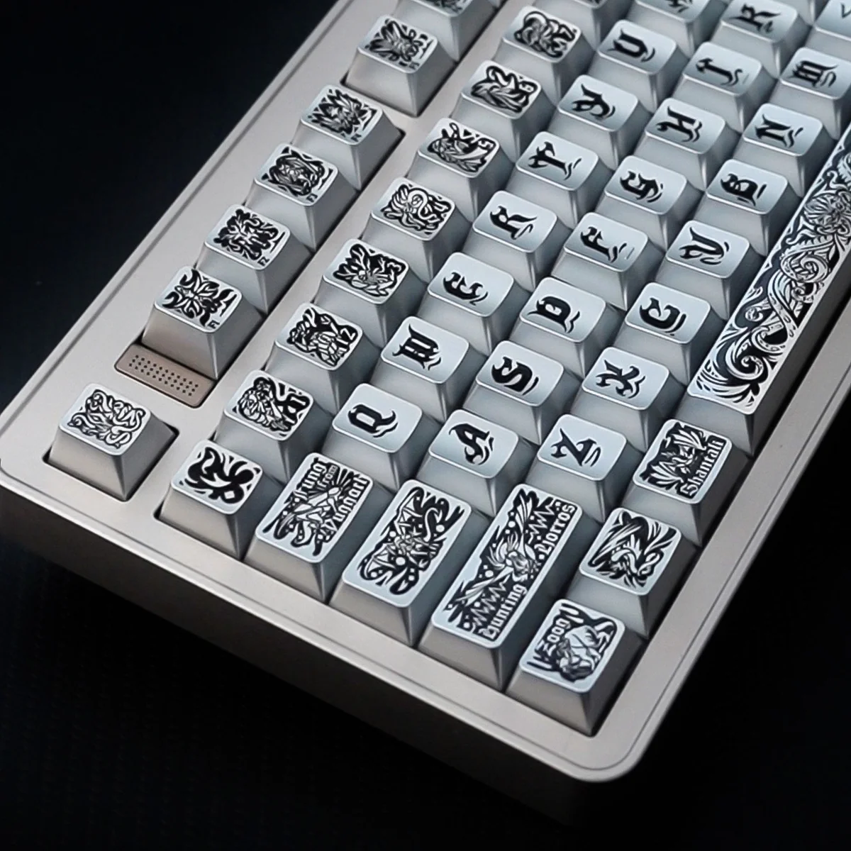 Detailed view of Cthulhu PBT keycaps set, showcasing the intricate tactile relief and metallic silver finish. This artistic angle captures the dark cosmic design.
