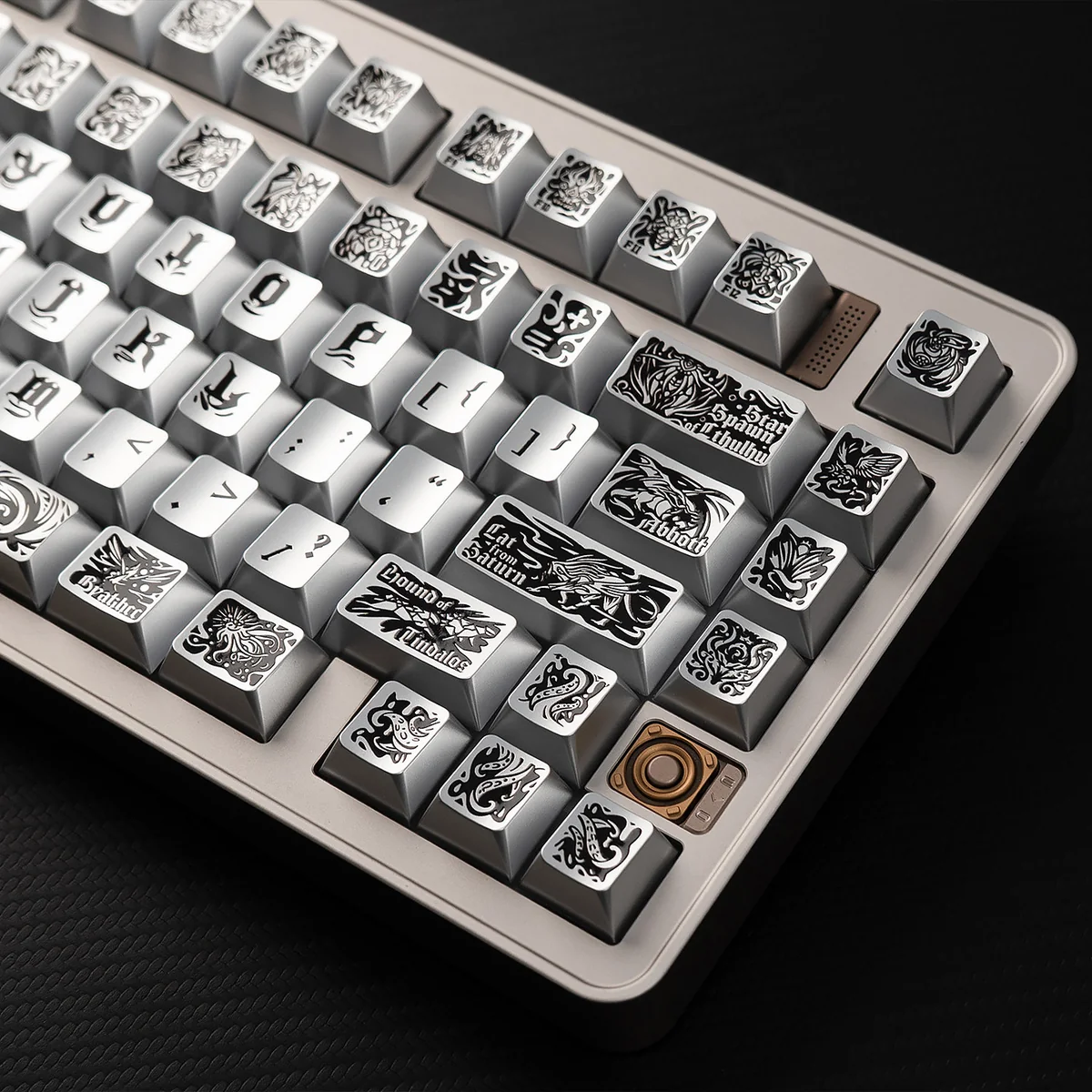 An artistic close-up of the Cthulhu PBT keycaps set, highlighting the tactile relief and metallic silver finish. These cosmic horror keycaps feature ancient gods design.