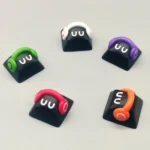 Detailed gallery views of the adorable handcrafted playful monster artisan resin keycap, highlighting its whimsical colors, charming details, and Cherry profile.