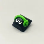 Adorable orange playful monster artisan resin keycap, handcrafted with whimsical details, perfect for a unique mechanical keyboard.