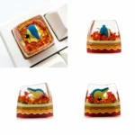 Handcrafted Cyndaquil Pokémon artisan keycap from various angles, highlighting its vibrant SA Profile resin sculpture and translucent effects for keyboard.
