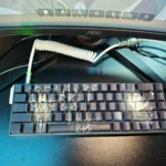 Darker than Black Hei PBT keycaps set. Various angles highlight the mysterious dark aesthetic and stealthy side-lit legends, perfect for anime RGB setups.