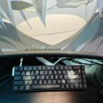 An exclusive Darker than Black Hei PBT keycap set, displaying its mysterious dark aesthetic and stealthy side-lit legends, optimized for vibrant RGB lightning design.