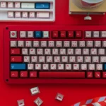 Artistic close-ups of DARLING FRANXX PBT keycaps set, revealing their futuristic anime aesthetic and unique metallic finish from multiple perspective view.