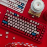 Artistic DARLING FRANXX PBT Keycap Set, showcasing a futuristic anime aesthetic with a captivating metallic sheen. Elevate your keyboard.