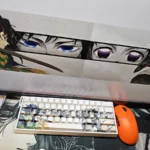 Artistic close-up of exclusive Demon Slayer Giyu & Shinobu translucent side-engraved keycaps set, highlighting sleek character legends.