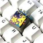 Close-up of a handcrafted Resin Calendar Keycap, showcasing its intricate miniature calendar with daily mood and weather icons from a unique angle.