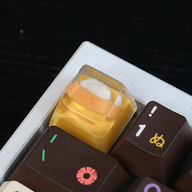 Charming handcrafted resin Joyful Dog Bowl Keycap, a miniature pet accessory with vibrant colors and intricate details, perfect for a playful keyboard.