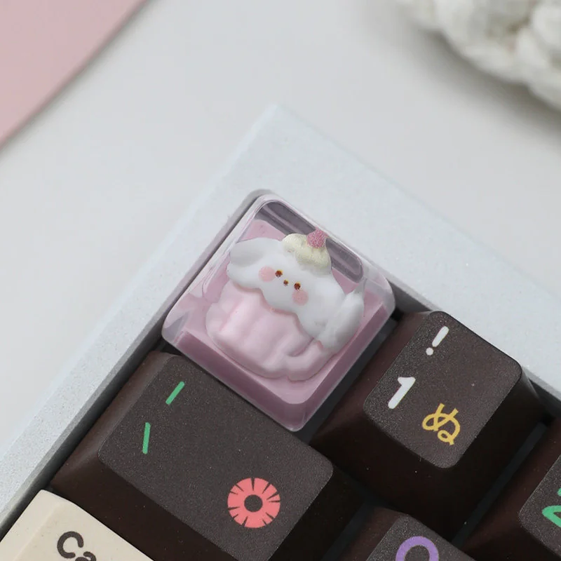 Adorable handcrafted resin artisan keycap featuring a whimsical dog waffle design and a sweet strawberry accent.